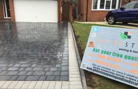 Premium charcoal block paving installation with a contrasting light grey border, completed for a residential driveway in Bromsgrove.